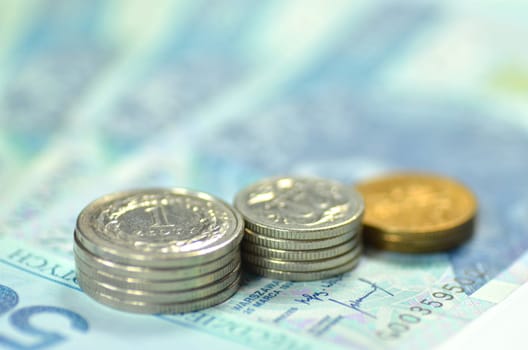 zloty banknotes and coins from poland