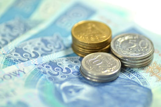 zloty banknotes and coins from poland