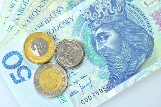 zloty banknotes and coins from poland