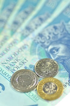 zloty banknotes and coins from poland