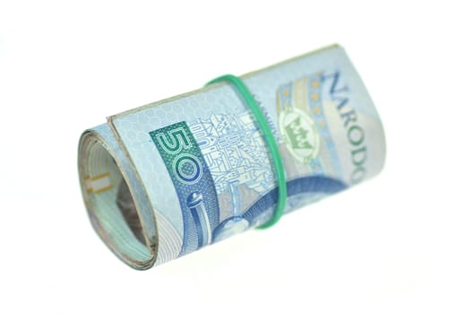 roll of polish banknotes isolated on white