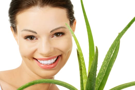 Young beautiful woman's face and aloe vera. Isolated on white background