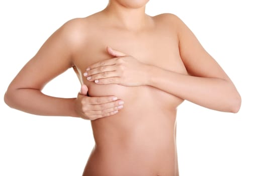 Woman examining breast mastopathy or cancer. Isolated on white