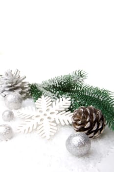 Christmas,decoration with fir branch,pine cone,Christmas bauble silver and white