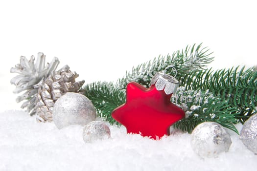 Christmas,decoration with fir branch,pine cone,Christmas bauble as a star red and white