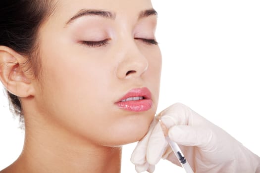 Cosmetic botox injection in the female face,lips zone