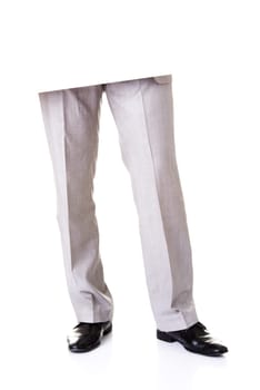 male legs and empty blank. closeup. isolated on white.