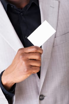 male businessman holding a business card. closeup.