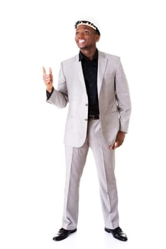 male businessman wearing a helmet. pointing. isolated on white.