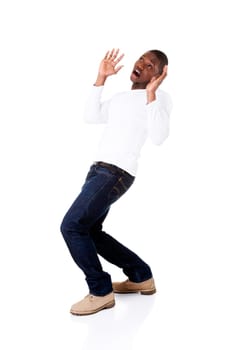 handsome young man standing,scared. isolated on white.