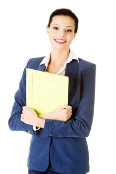attractive woman holding files. isolated on white.