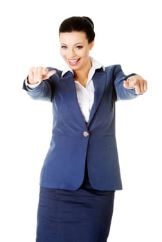 attractive businesswoman pointing. isolated on white.