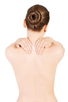 attractive woman trying to touch both hands on her back. isolated on white.