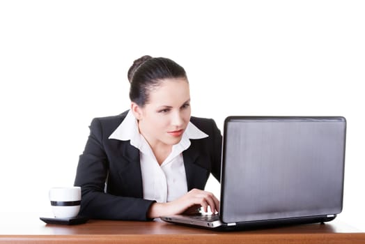 business woman sitting with a laptop. isolated on white.