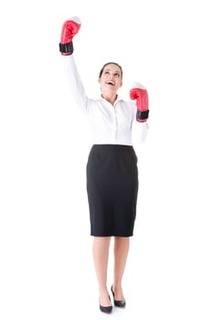 business woman wearing boxing gloves. idolated on white.
