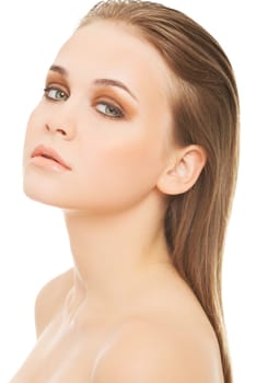 attractive woman's face. closeup. she's looking at camera. isolated on white.