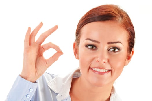Young woman showing ok gesture isolated on white