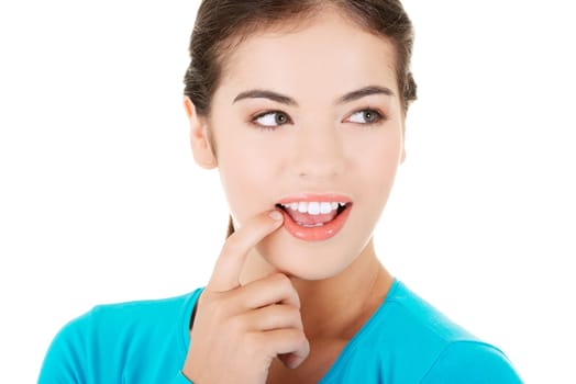 attractive woman's face with a smile on her lips. isolated on white.