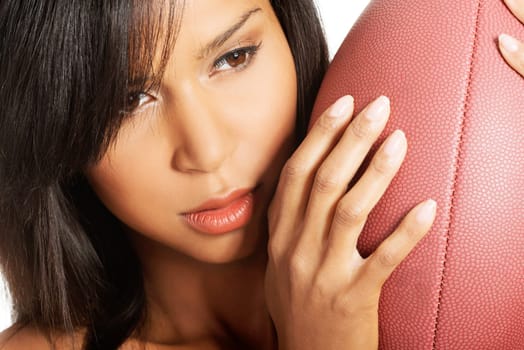 attractive naked woman holding a ball. closeup. isolated on white.