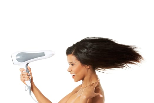 attractive woman drying her hair.isolated on white.
