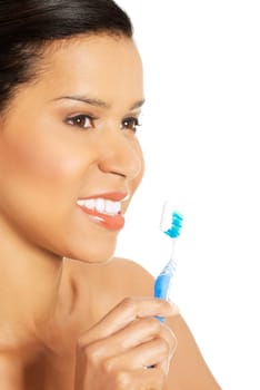 attractive naked woman with toothbrush. isolated on white.