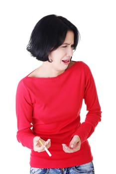 attractive woman pointing down. isolated on white.