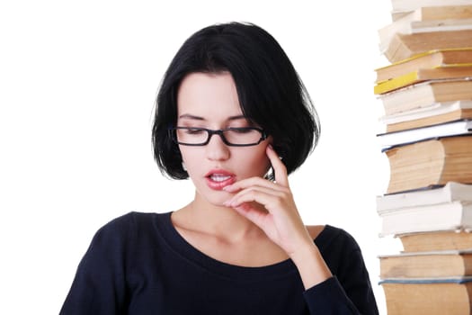 women in eyeglasses that stack of books. isolated on white.