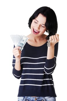 attractive girl with money and house on hands. isolated on white.