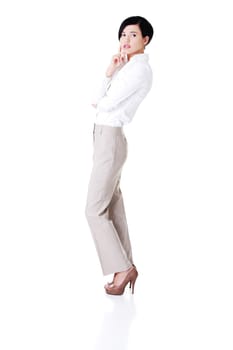 attractive young businesswoman. vertical. front view. isolated on white.