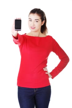 attractive casual woman with cellphone. isolated on white.