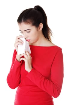 happy casual woman with tissue. isolated on white.