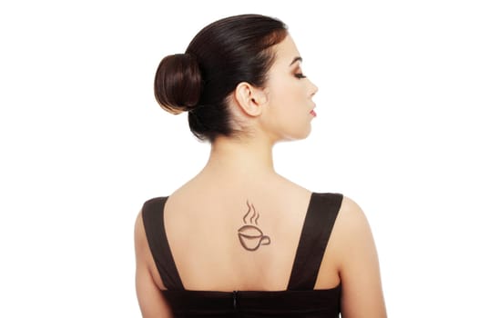 attractive woman with coffee cup painted on her back. isolated on white.