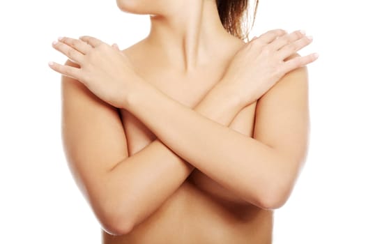 sexy beautiful naked woman covering her breasts. isolated on white.