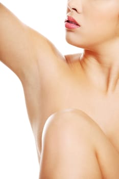 female's naked body part. close up. isolated on white.