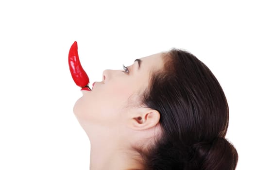 female's profile with chilii in mouth.