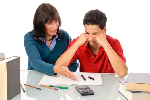 A grown woman,mother helps her son at the desk with homework,studying for the exam,against a white background.