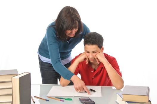 A grown woman,mother helps her son at the desk with homework,studying for the exam,against a white background.