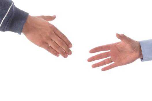 Mother and son shake hands in front of a white background.