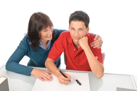 A grown woman,mother helps her son at the desk with homework,studying for the exam,against a white background.