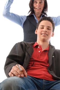 The boy sits casually in the room and smokes,the mother stands horrified behind it,in front of a white background.