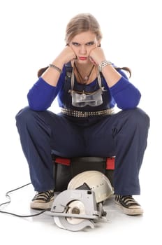Wildew's teenage girl as a trainee (apprentice) with blue man (work suit) and braids sits frustrated on a toolbox against a white background