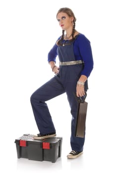 Wildew's teenage girl as an apprentice with blue man (work suit) and braids holds a handsaw in his hand against a white background