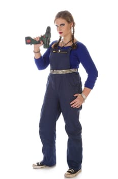 Wildew's teenage girl as a trainee (apprentice) with blue man (work suit) and braids poses with a cordless Borhschrauber against a white background
