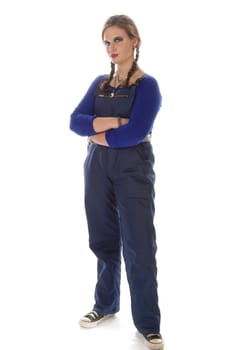 Wildew's teenage girl as an apprentice with blue man (work suit) and braids looks genervert into the camera in front of a white background