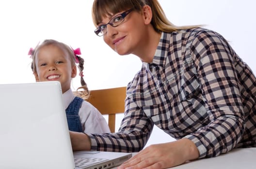 mother and daughter on the computer