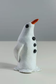 Model of a snow penguin standing proud