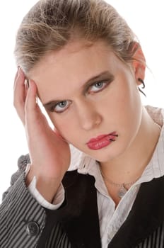 Young woman in grey business suit and high heels is annoyed and has head clipping against a white background,portrait
