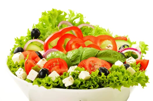 Vegetable salad bowl isolated on white background