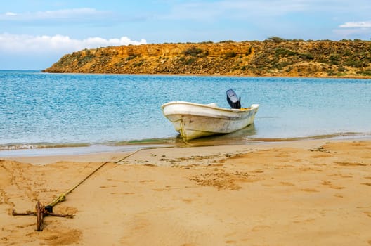 Boat anchored to the shore near Punta Gallinas in La Guajira, Colombia