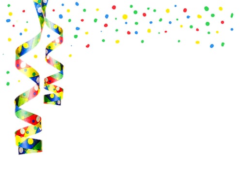 Streamers and confetti hanging,isolated as party decoration for New Year's Eve and celebrations with white background